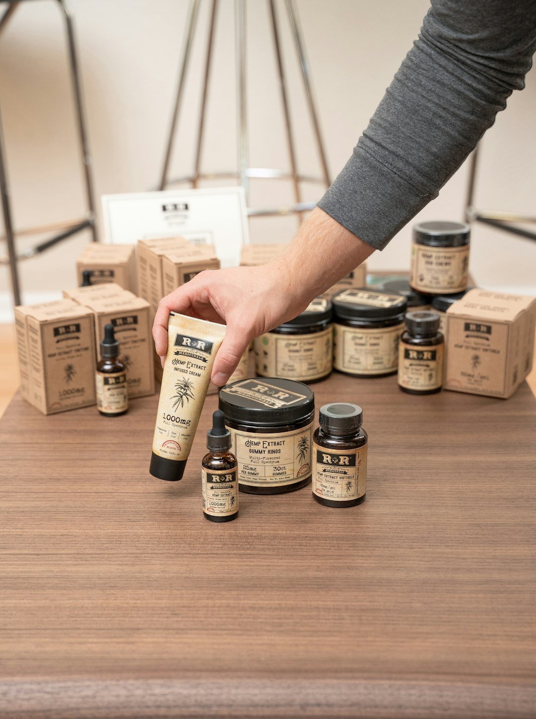 Various wellness products containing full spectrum Cannabidiol (CBD) from R+R Medicinals, including oil tinctures, topical cream, edible gummies, and pet products are visible on the shelves of a boutique retail store in Denver, Colorado, Oct 14, 2020. Photo courtesy R+R Medicinals.